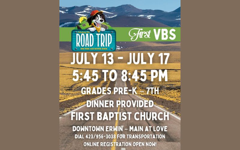 Promotional flyer for First Baptist Church's Vacation Bible School with the theme "Road Trip: On the Go with God." The flyer features a scenic highway leading toward mountains, with a cartoon dog wearing a travel hat above a road sign-style logo. Vacation Bible School will be held July 13–17 from 5:45 p.m. to 8:45 p.m. for children in Pre-K through 7th grade. Dinner will be provided. The event takes place at First Baptist Church, Downtown Erwin, Main at Love. Transportation is available by calling 423-956-3038, and online registration is now open.